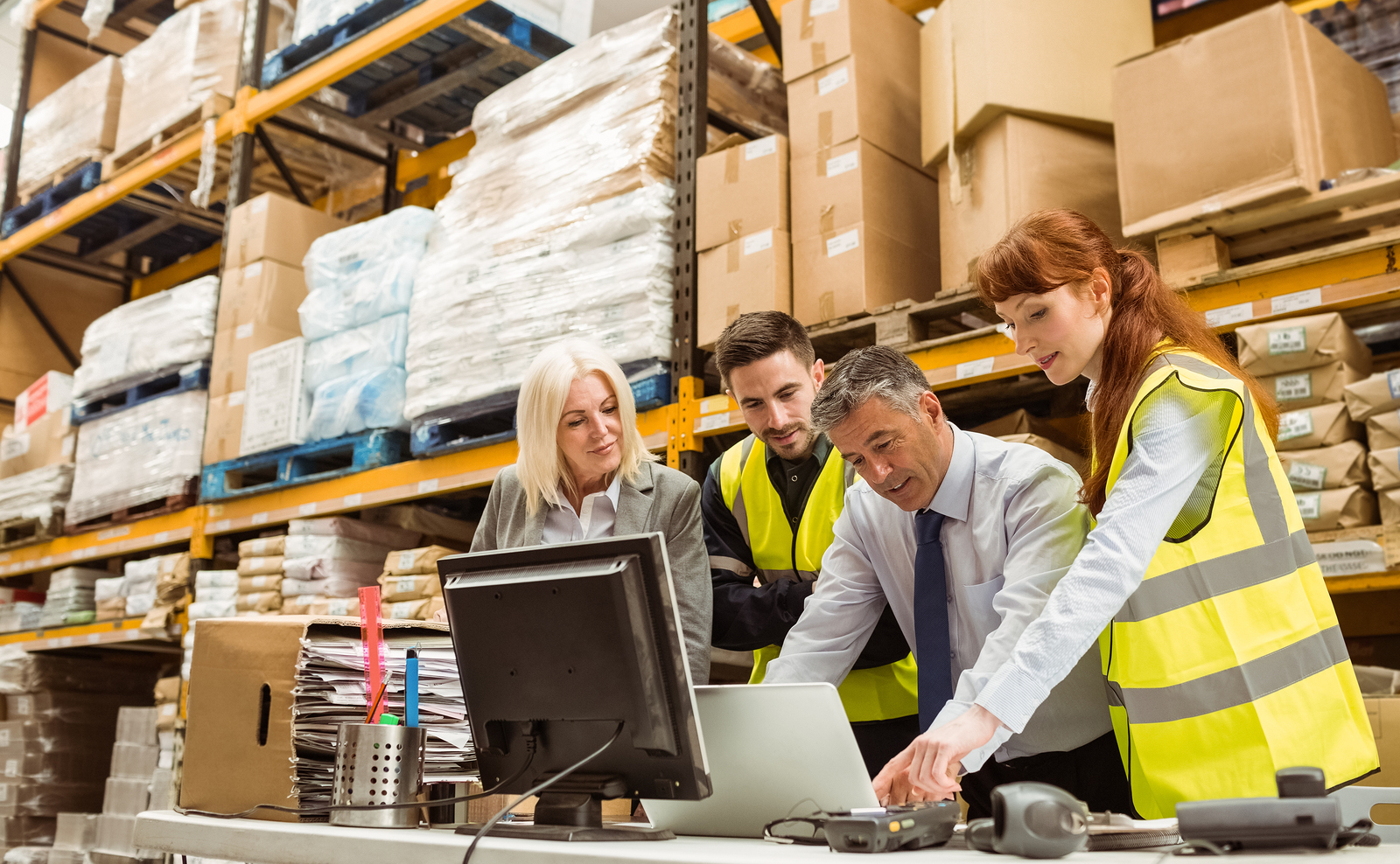 family working together in manufacturing warehouse | succession planning for family businesses