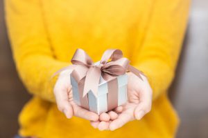woman stretching out | holiday tax benefits