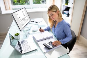 woman working on nonprofit accounting