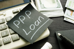 PPP loan on post it and calculator | ppp loan is not taxable